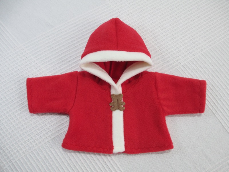 Kapuzenjacke aus Fleece in Rot mit Teddyapplikation