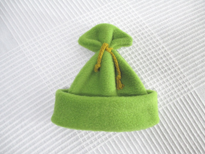 Jacke und Mütze aus Fleece in Grün